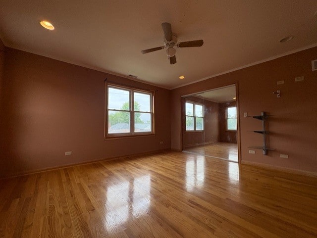 8834 S E End Ave, Chicago, IL 60617 - spare room featuring ceiling fan, baseboards, light wood finished floors, crown molding, and recessed lighting