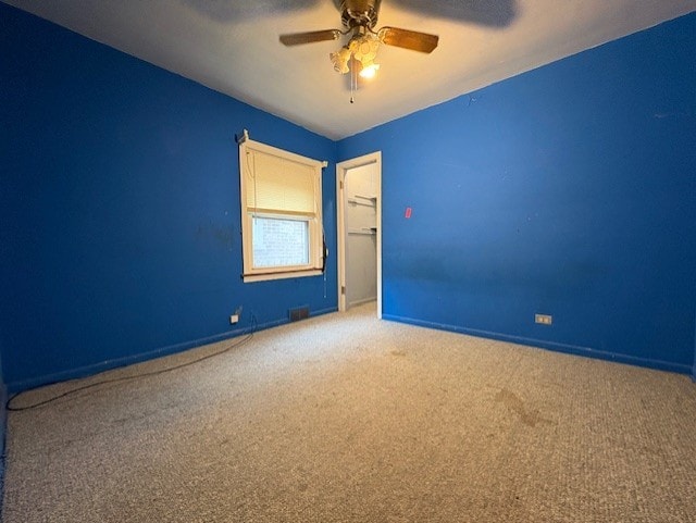 8834 S E End Ave, Chicago, IL 60617 - spare room featuring carpet flooring, a ceiling fan, and baseboards