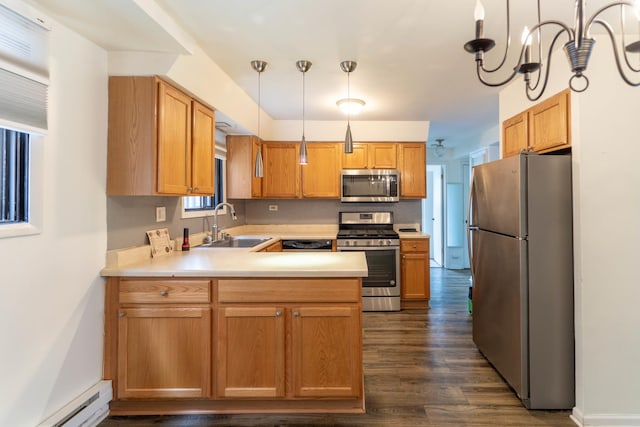 6319 W 64th Pl Unit 1N, Chicago, IL 60638 - kitchen featuring appliances with stainless steel finishes, baseboard heating, a peninsula, light countertops, and dark wood-style flooring