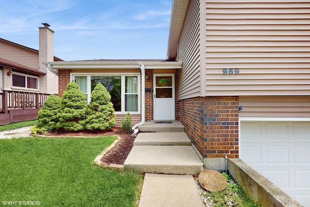 959 S Fern Ave, Elmhurst, IL 60126 - doorway to property featuring brick siding and an attached garage
