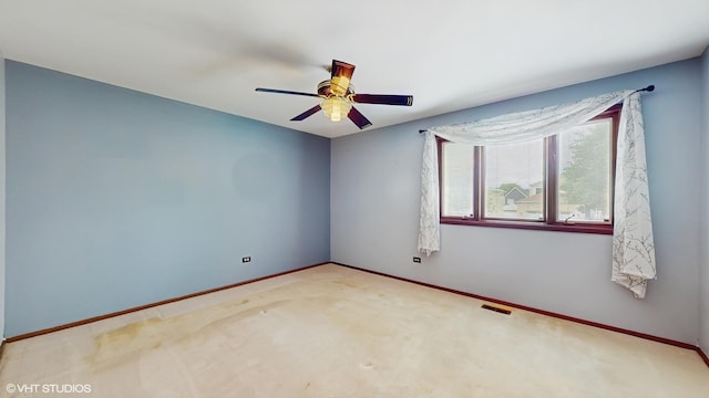 959 S Fern Ave, Elmhurst, IL 60126 - carpeted spare room featuring a ceiling fan and baseboards