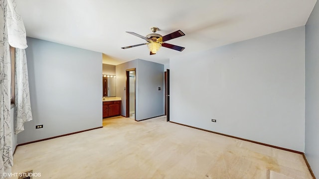 959 S Fern Ave, Elmhurst, IL 60126 - unfurnished bedroom with baseboards, ensuite bathroom, light carpet, and ceiling fan