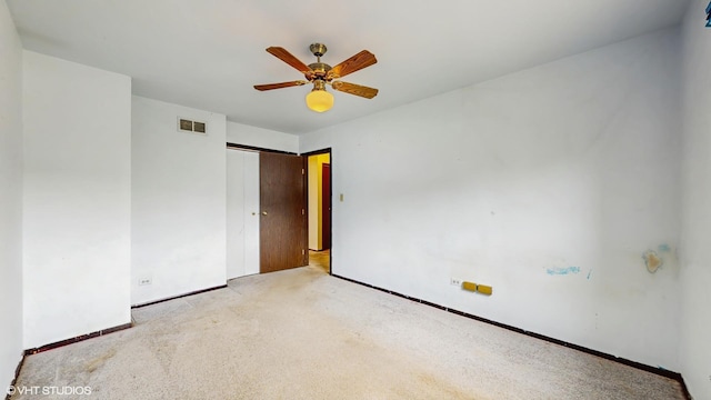 959 S Fern Ave, Elmhurst, IL 60126 - carpeted empty room featuring a ceiling fan and baseboards