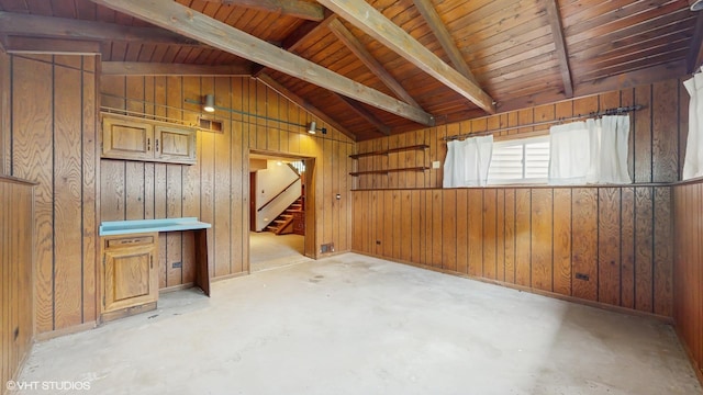 959 S Fern Ave, Elmhurst, IL 60126 - spare room featuring concrete flooring, wood walls, and stairs