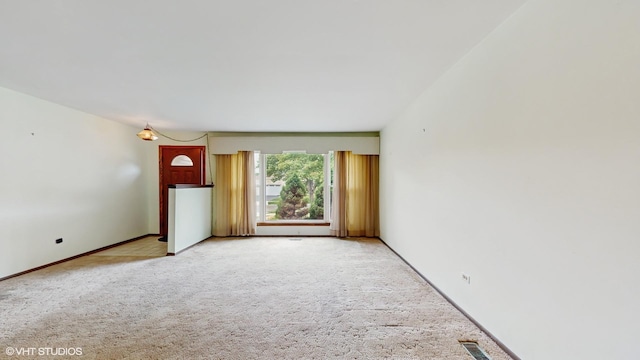 959 S Fern Ave, Elmhurst, IL 60126 - empty room featuring light colored carpet and baseboards