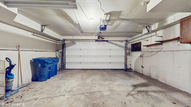 959 S Fern Ave, Elmhurst, IL 60126 - garage with a garage door opener