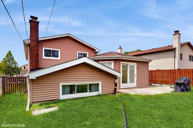 959 S Fern Ave, Elmhurst, IL 60126 - back of property featuring a chimney and a patio area