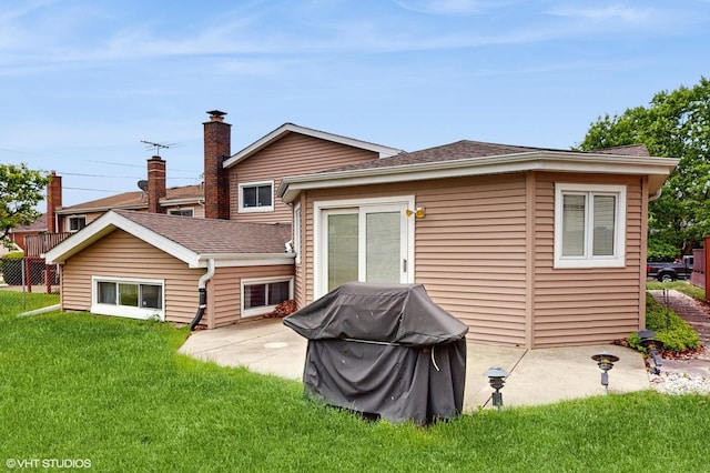 959 S Fern Ave, Elmhurst, IL 60126 - rear view of house with a yard, a patio area, and roof with shingles