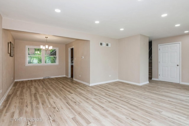 407 Greenfield Rd, Shorewood, IL 60404 - empty room with a chandelier, light wood-type flooring, baseboards, recessed lighting, and stairway