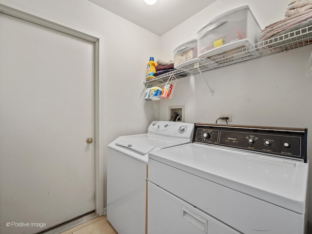 1937 N Coldspring Rd, Arlington Heights, IL 60004 - washroom featuring washing machine and clothes dryer and light tile patterned flooring