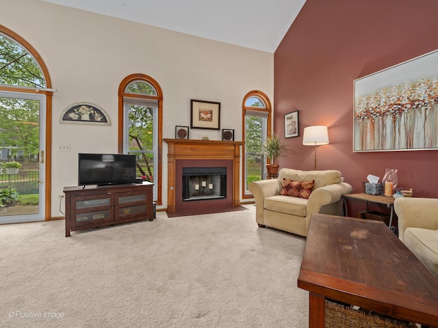 1937 N Coldspring Rd, Arlington Heights, IL 60004 - living room with high vaulted ceiling, carpet floors, and a fireplace with flush hearth