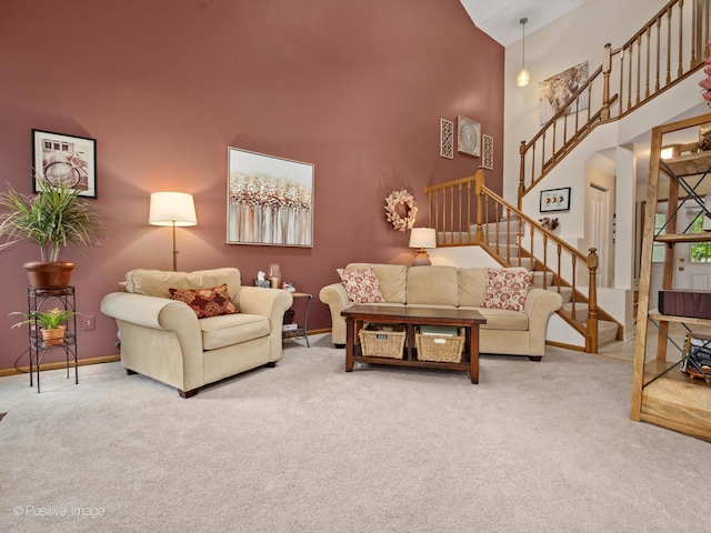 1937 N Coldspring Rd, Arlington Heights, IL 60004 - living room featuring a high ceiling, carpet, stairway, and baseboards