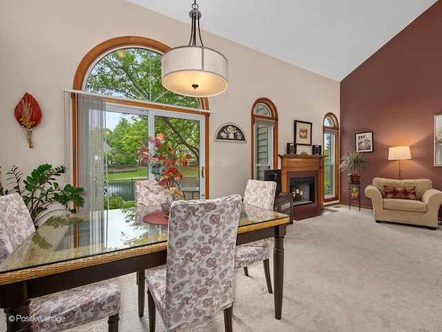 1937 N Coldspring Rd, Arlington Heights, IL 60004 - dining room featuring carpet, high vaulted ceiling, and a fireplace