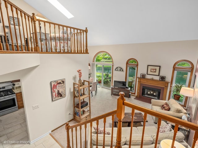 1937 N Coldspring Rd, Arlington Heights, IL 60004 - stairs featuring a fireplace with flush hearth and high vaulted ceiling