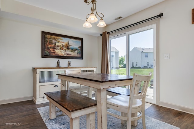 25122 Faraday Rd, Manhattan, IL 60442 - dining space featuring dark wood-style flooring and baseboards