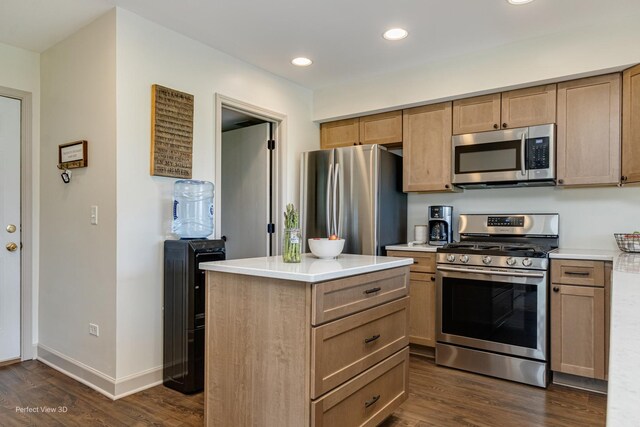 25122 Faraday Rd, Manhattan, IL 60442 - kitchen with stainless steel appliances, dark wood-style floors, light countertops, recessed lighting, and a kitchen island