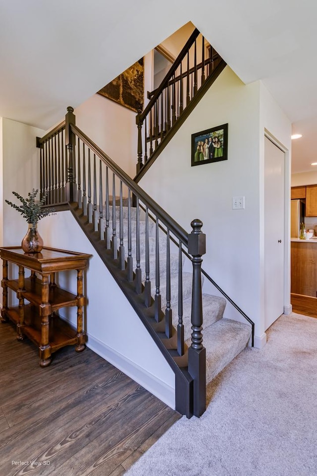 25122 Faraday Rd, Manhattan, IL 60442 - stairs featuring baseboards, wood finished floors, and recessed lighting