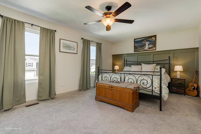 25122 Faraday Rd, Manhattan, IL 60442 - bedroom featuring multiple windows, light colored carpet, and a ceiling fan