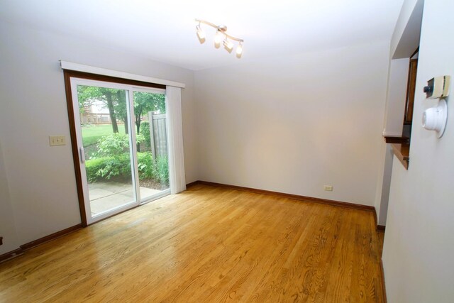 176 Millers Xing, Itasca, IL 60143 - unfurnished room featuring light wood-style floors and baseboards