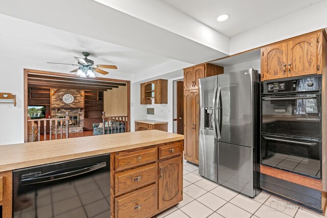 19N050 Felsmith Rd, Hampshire, IL 60140 - kitchen featuring black appliances, light tile patterned floors, a ceiling fan, and brown cabinets