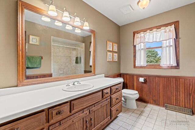 19N050 Felsmith Rd, Hampshire, IL 60140 - full bath featuring vanity, a wainscoted wall, a shower, tile patterned flooring, and wood walls