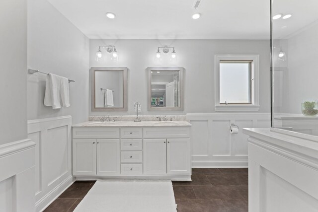 2510 Marian Ln, Wilmette, IL 60091 - bathroom with double vanity, a decorative wall, a wainscoted wall, and tile patterned flooring