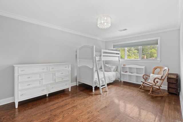 2510 Marian Ln, Wilmette, IL 60091 - bedroom with ornamental molding, dark wood-style floors, a chandelier, and baseboards