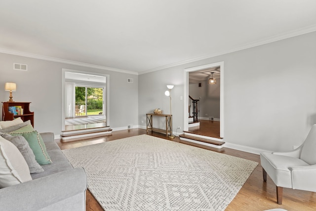 2510 Marian Ln, Wilmette, IL 60091 - bedroom with wood finished floors, crown molding, and baseboards