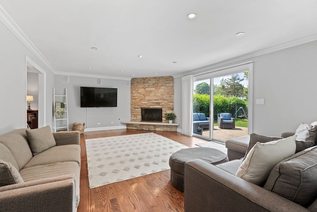 2510 Marian Ln, Wilmette, IL 60091 - living area with wood finished floors, crown molding, a stone fireplace, and recessed lighting