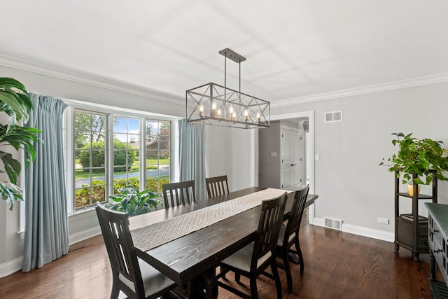 2510 Marian Ln, Wilmette, IL 60091 - dining area with a chandelier, dark wood-type flooring, baseboards, and crown molding