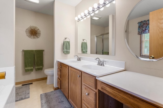 1912 Oak Park Dr, Champaign, IL 61822 - full bath featuring double vanity, toilet, a shower with door, baseboards, and a bathtub