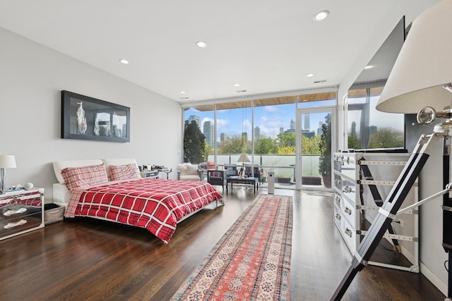 919 N Larrabee St Unit 3N, Chicago, IL 60610 - bedroom with access to outside, wood finished floors, expansive windows, and recessed lighting