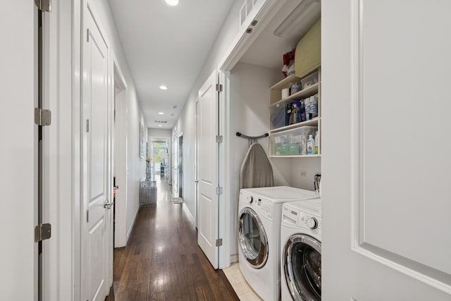 919 N Larrabee St Unit 3N, Chicago, IL 60610 - washroom featuring wood finished floors, recessed lighting, and independent washer and dryer