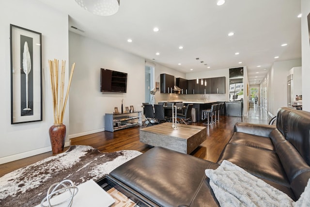 919 N Larrabee St Unit 3N, Chicago, IL 60610 - living room with recessed lighting, dark wood-style floors, and baseboards