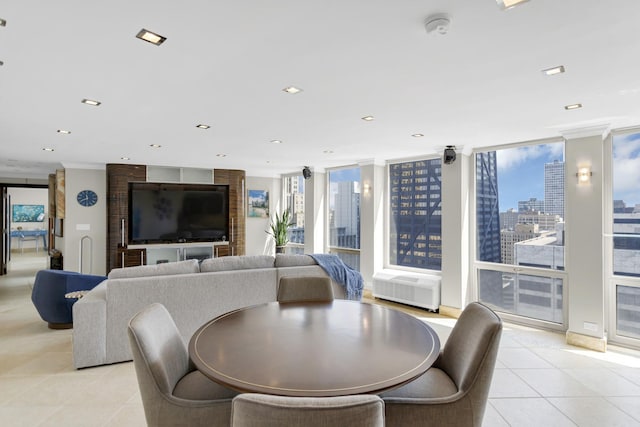 111 E Chestnut St Unit 24C, Chicago, IL 60611 - dining area featuring light tile patterned floors, recessed lighting, and ornamental molding