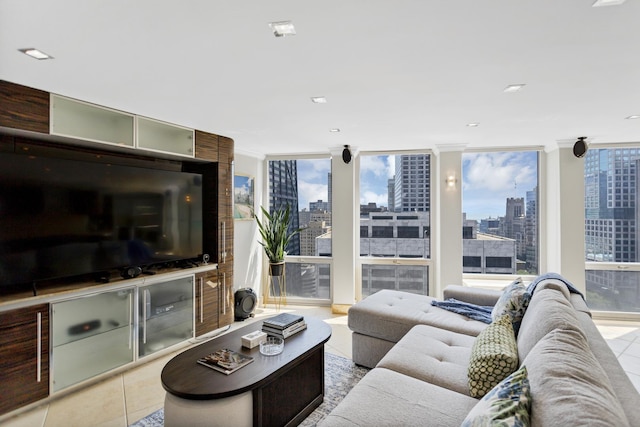 111 E Chestnut St Unit 24C, Chicago, IL 60611 - living room featuring a skyline view, crown molding, and a wall of windows