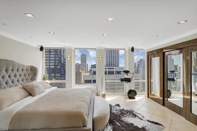 111 E Chestnut St Unit 24C, Chicago, IL 60611 - tiled bedroom with a skyline view, crown molding, and recessed lighting