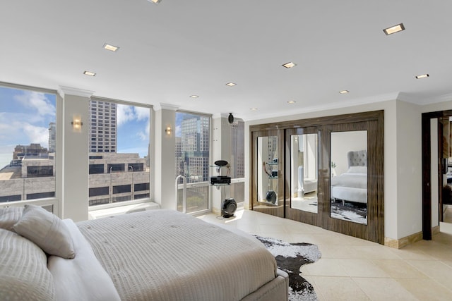 111 E Chestnut St Unit 24C, Chicago, IL 60611 - tiled bedroom with ornamental molding, access to outside, recessed lighting, a city view, and baseboards