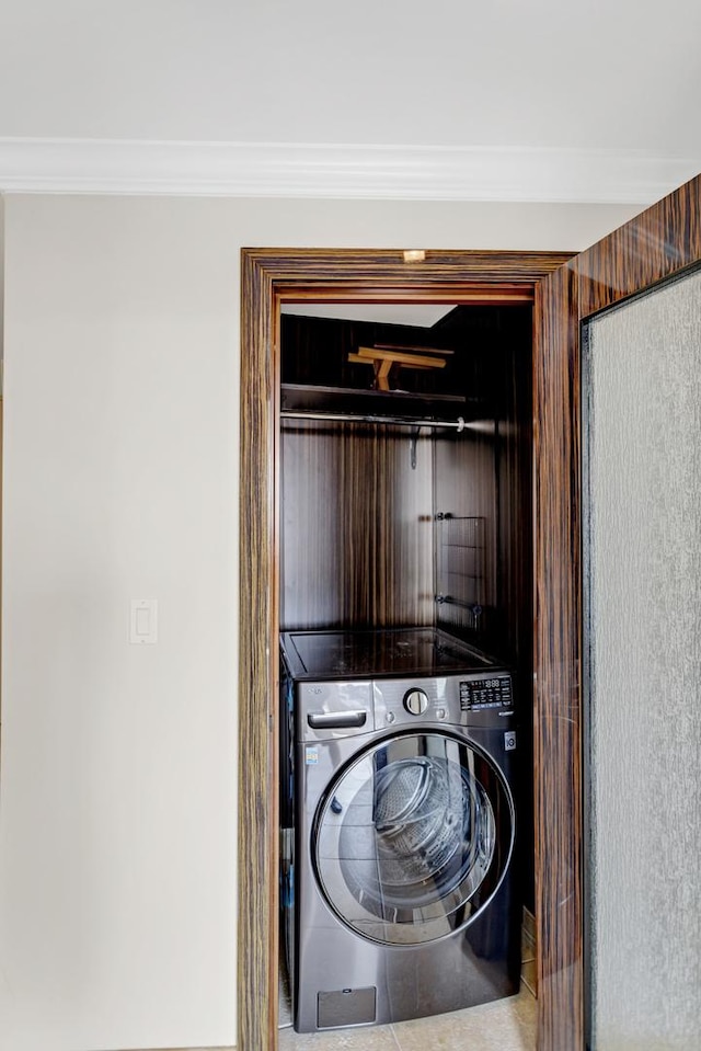 111 E Chestnut St Unit 24C, Chicago, IL 60611 - laundry area with washer / clothes dryer and crown molding