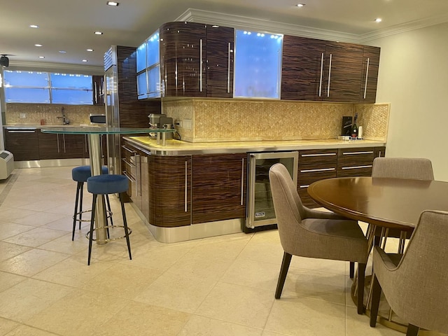 111 E Chestnut St Unit 24C, Chicago, IL 60611 - indoor bar featuring wine cooler, tasteful backsplash, crown molding, and recessed lighting