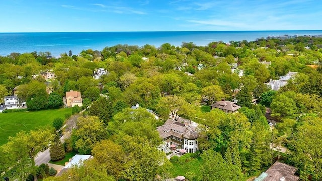 aerial view of property's location featuring a large body of water