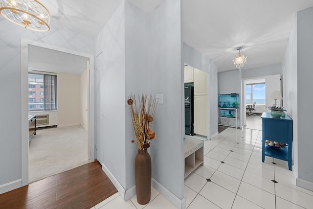 4250 N Marine Dr Unit 1622, Chicago, IL 60613 - hall with a chandelier and baseboards