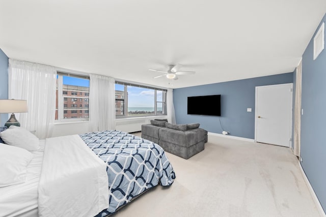 4250 N Marine Dr Unit 1622, Chicago, IL 60613 - carpeted bedroom featuring ceiling fan, baseboards, and radiator