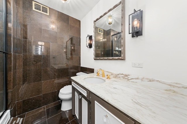 4250 N Marine Dr Unit 1622, Chicago, IL 60613 - full bath with vanity, toilet, tiled shower, and granite floors