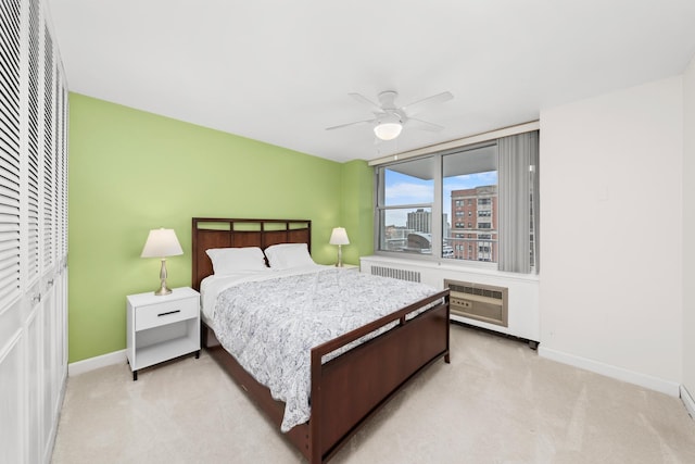 4250 N Marine Dr Unit 1622, Chicago, IL 60613 - bedroom featuring baseboards, light carpet, a ceiling fan, and a view of city