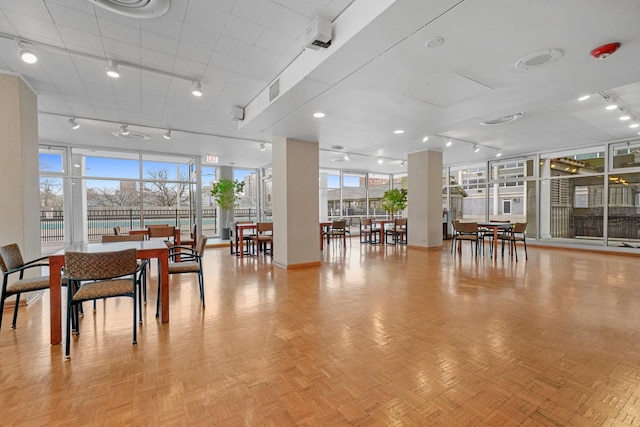 4250 N Marine Dr Unit 1622, Chicago, IL 60613 - dining space featuring floor to ceiling windows, healthy amount of natural light, and rail lighting