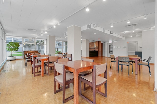 4250 N Marine Dr Unit 1622, Chicago, IL 60613 - dining room with rail lighting