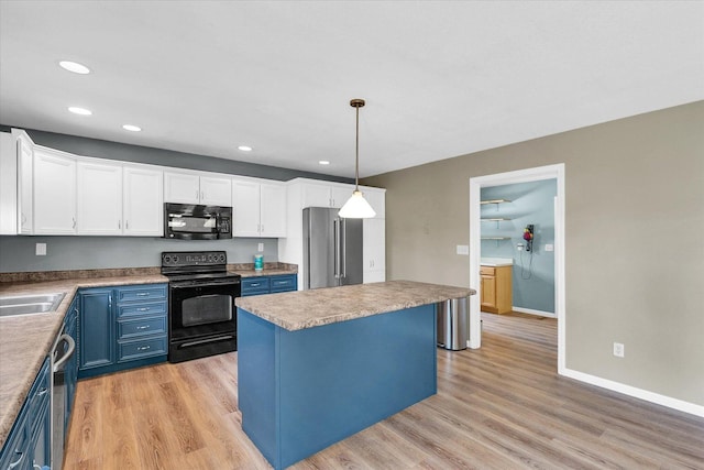 2302 Slade Ln, Mahomet, IL 61853 - kitchen featuring black appliances, blue cabinetry, white cabinets, light wood finished floors, and recessed lighting
