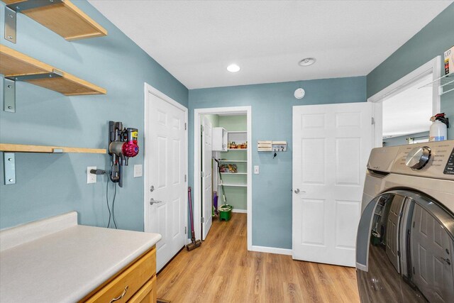 2302 Slade Ln, Mahomet, IL 61853 - laundry area with washer / clothes dryer, light wood-style flooring, and recessed lighting