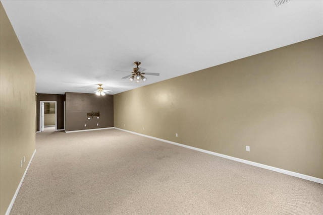 2302 Slade Ln, Mahomet, IL 61853 - unfurnished room featuring light carpet and a ceiling fan
